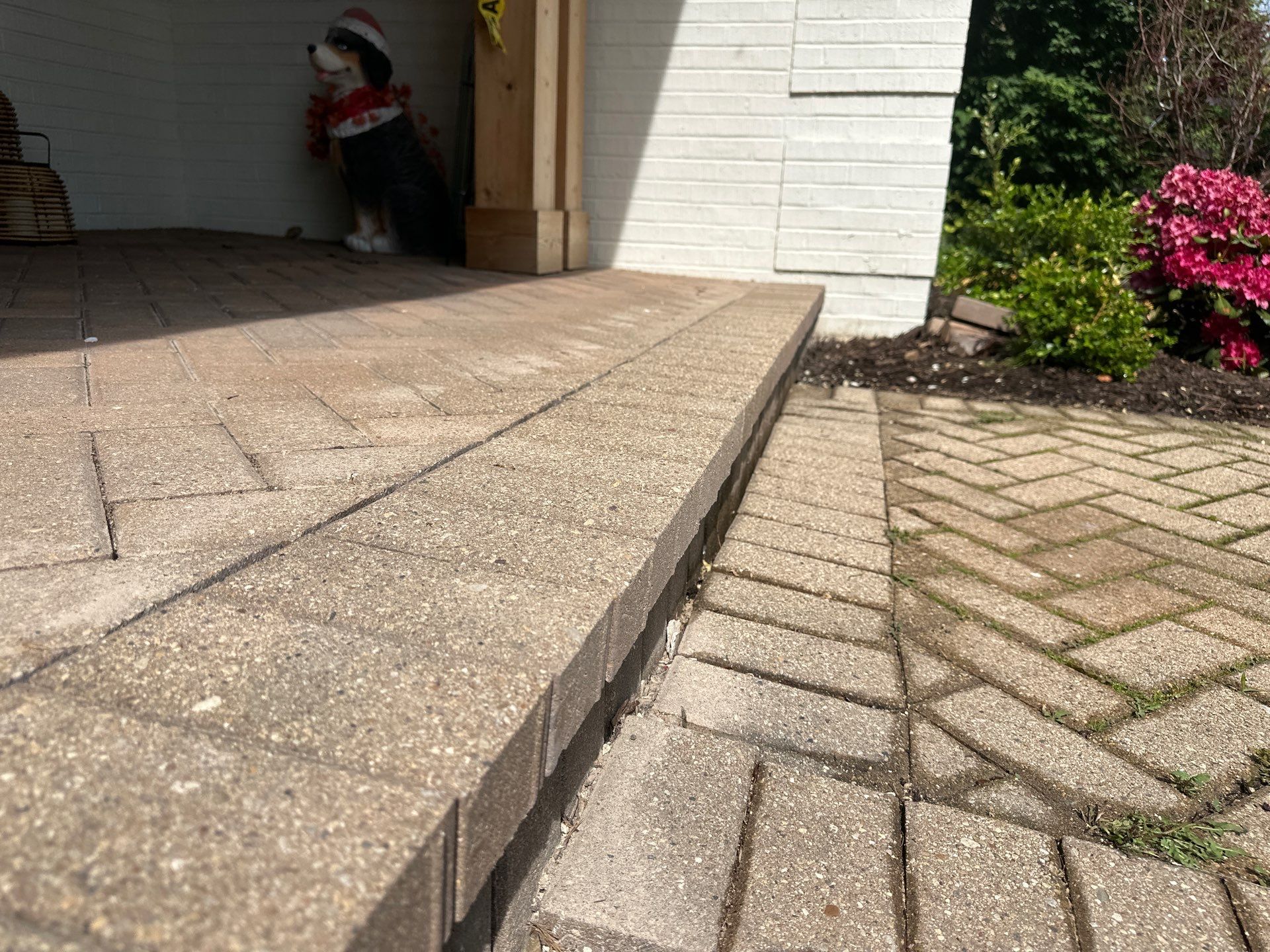 Brick paver repair, cleaning and sealing by Northern Power Washing LLC.