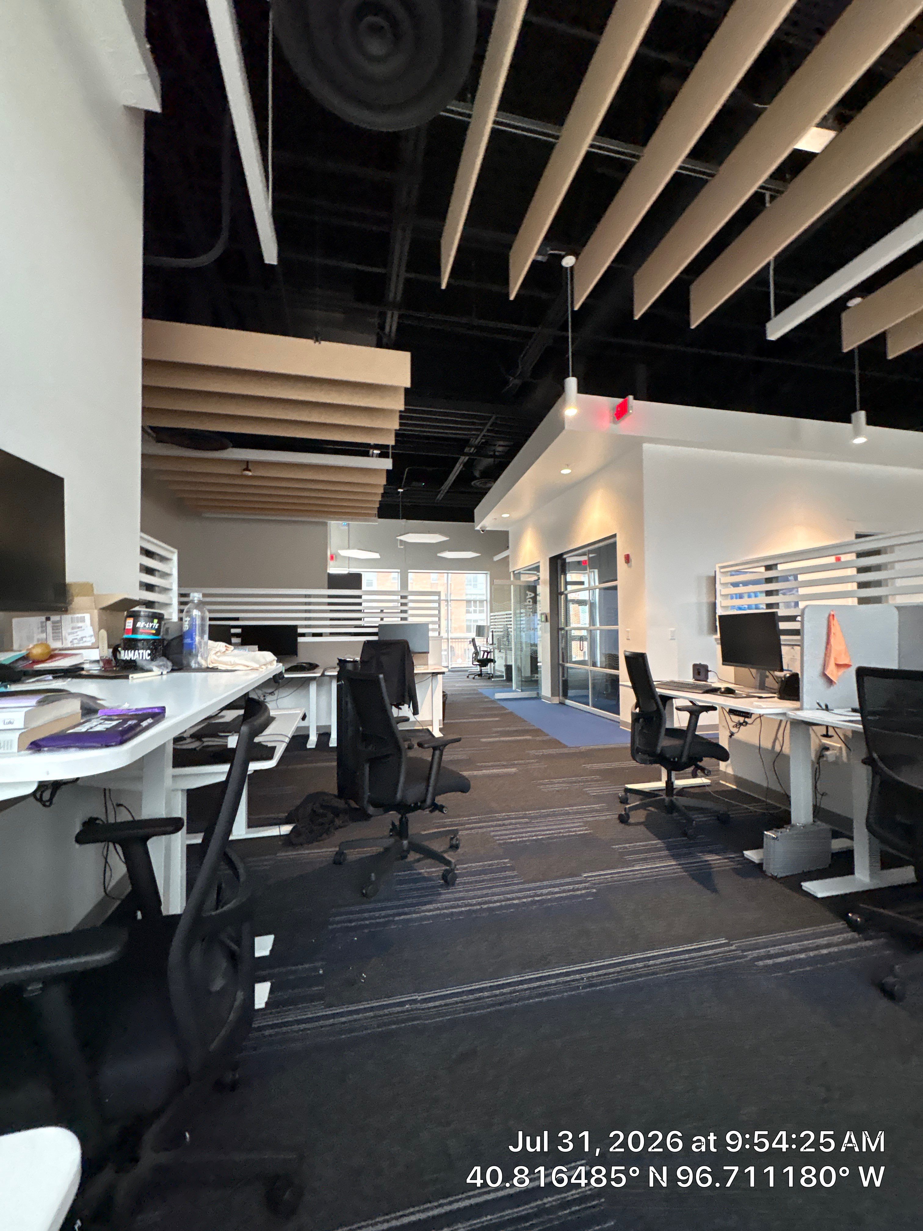 Modern Commercial Office Fit-Out with Acoustic Baffles in Lincoln by CompanyCam Sales Demo