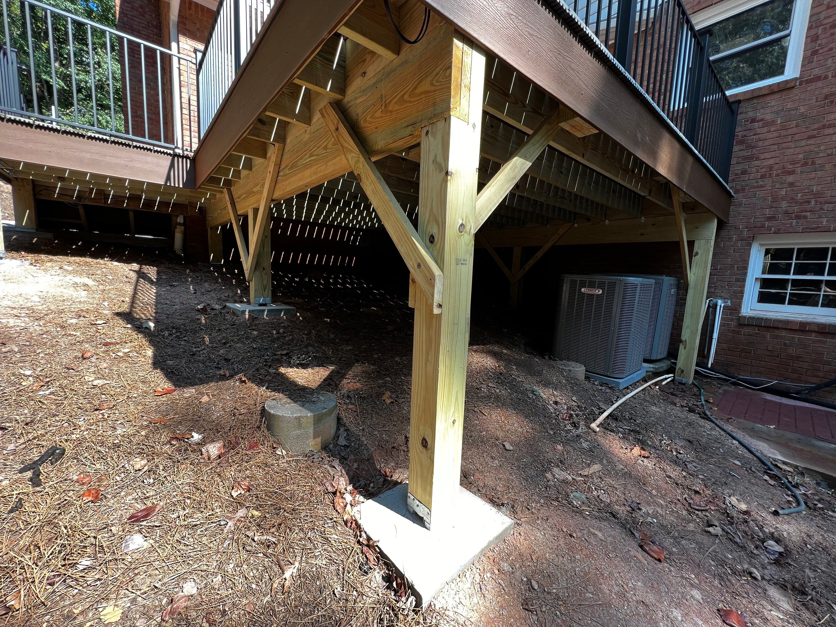 Elevated Composite Deck Installation with Metal Railings in Atlanta by Swift Home Renovations