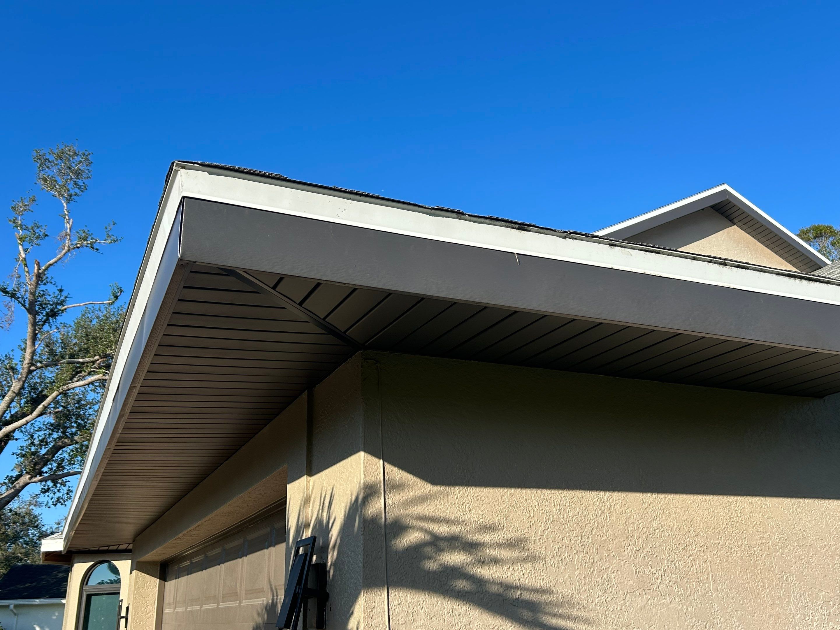 Black Seamless Gutters in Sarasota FL by Gutter Professors
