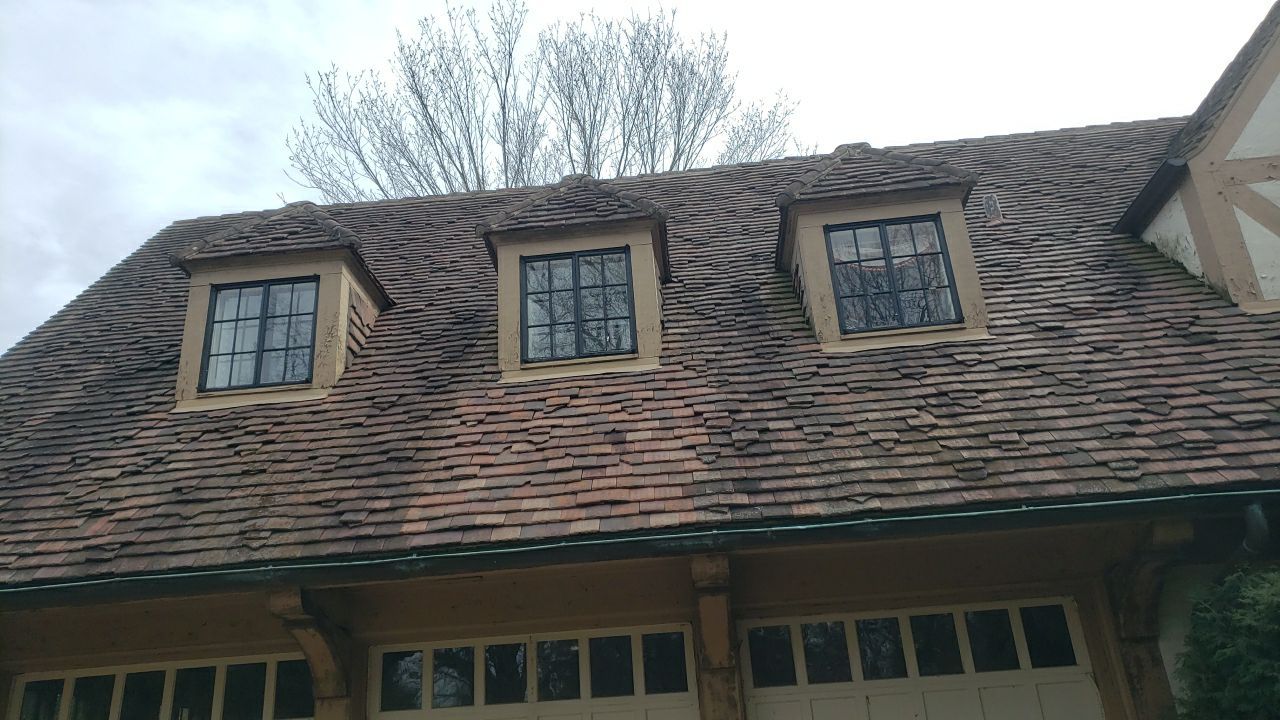 Ludowici Roof Installment and Half Round Copper Gutter Replacement  by Custom Installations