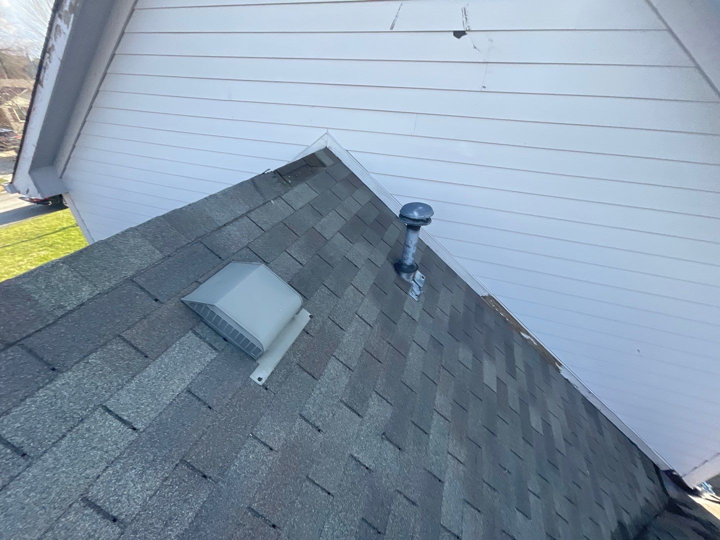 Tornado damage in Whiteland. Roof replacement, James Hardie siding, exterior paint, gutters, windows, doors by 317 Roofing & Restorations