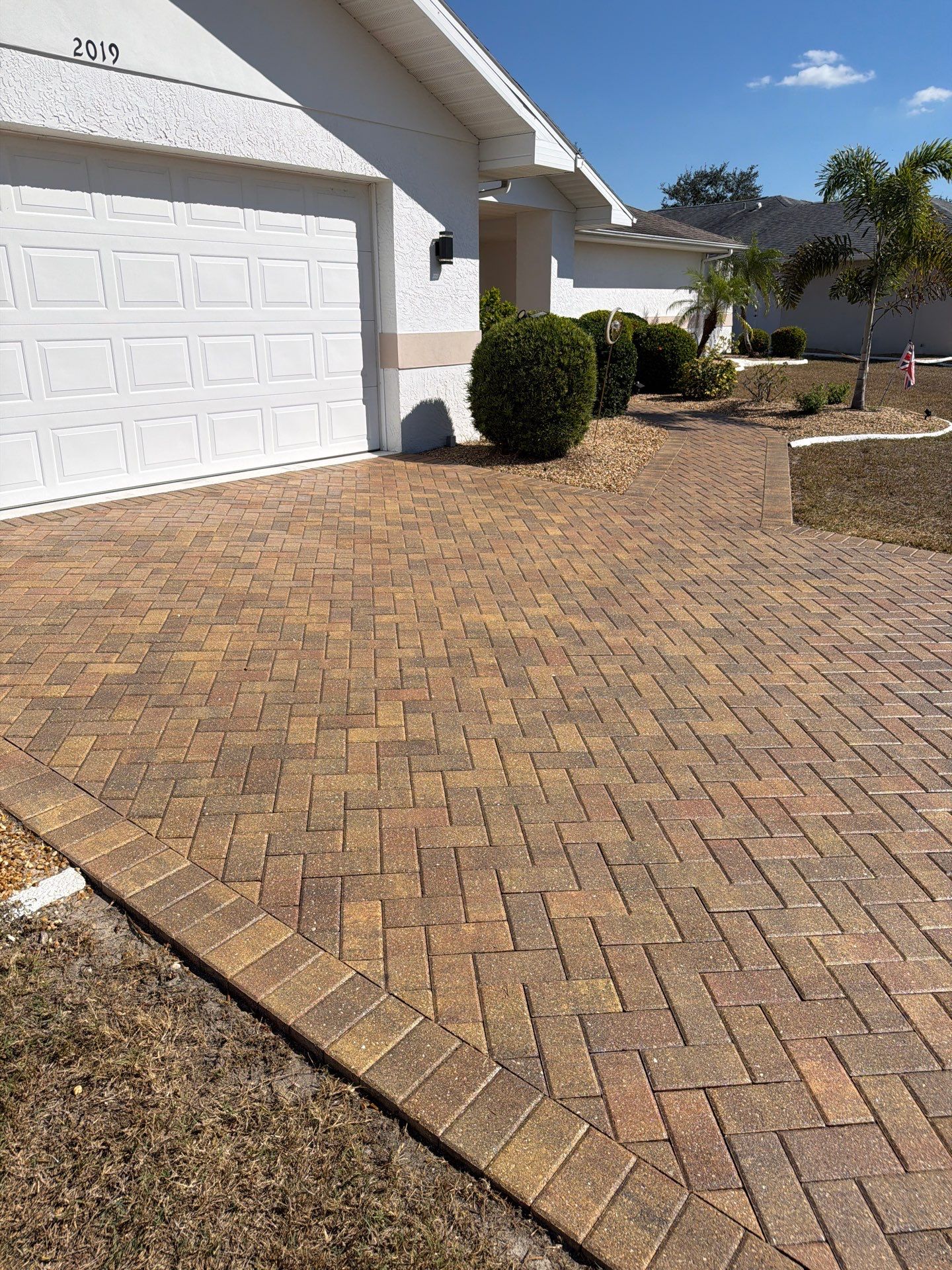 Restoring Herringbone Paver Driveway and Walkway in Sun City Center by Supreme Paver Experts