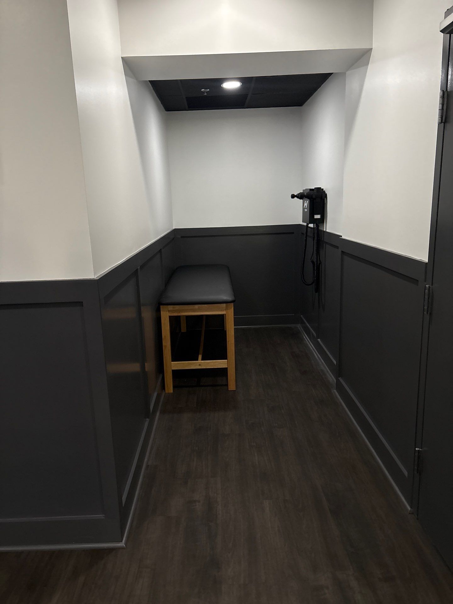 Northlake OLF - Recovery room renovation, flooring installation, front desk, accent wall by Nova HomeWorks 