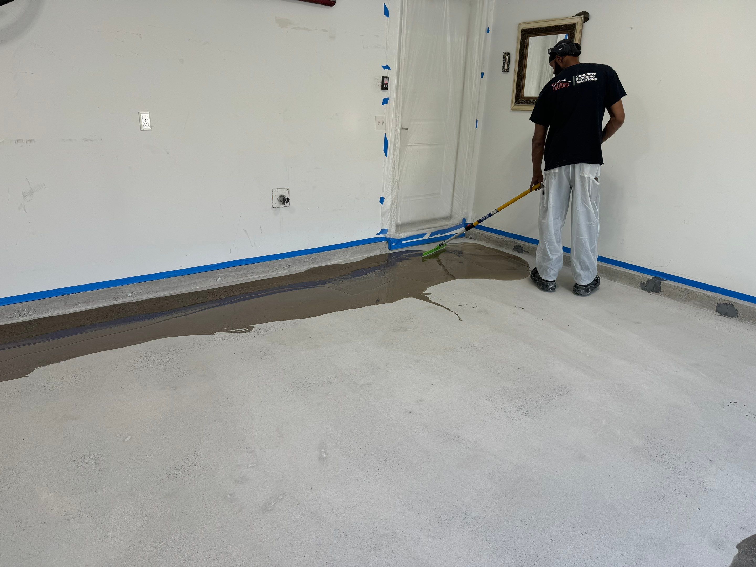 Garage Floor Coating Transformation by DiGiorgi Roofing and Siding Inc