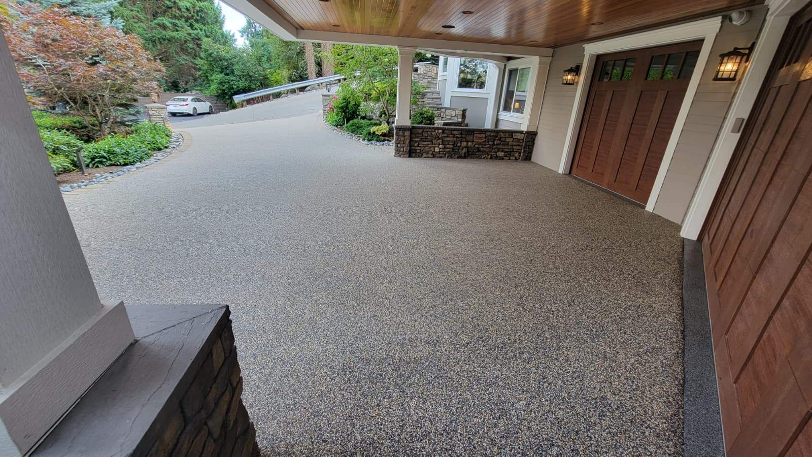 Coastal Grandeur Driveway and Patio in Big Sur Vuba Stone by Concrete Coating Experts Inc.