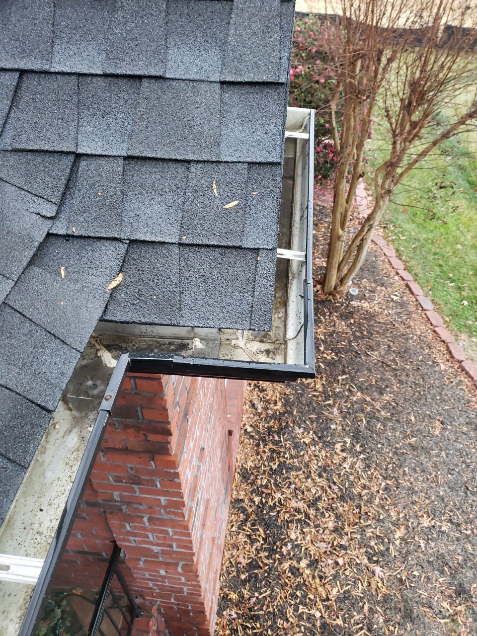 Gutter Cleaning using water by Power Wash Masters LLC