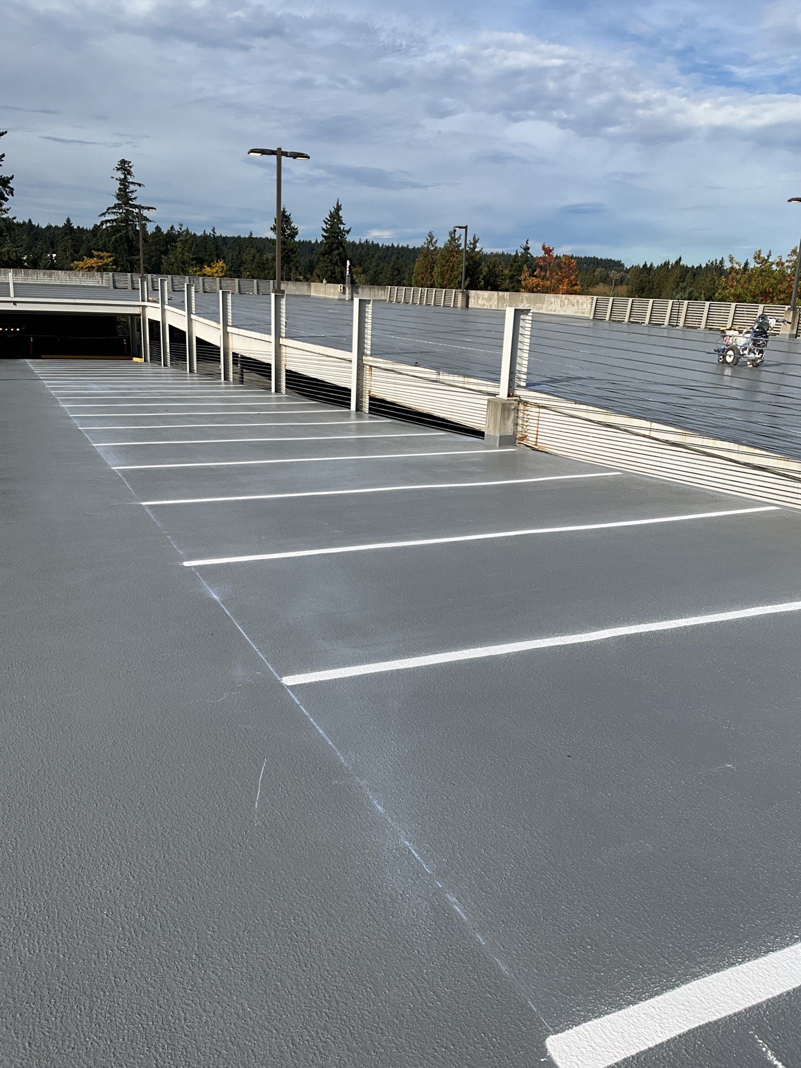 Corti Construction | Striping for Concrete Parking Lot by Jireh Asphalt & Concrete Inc 