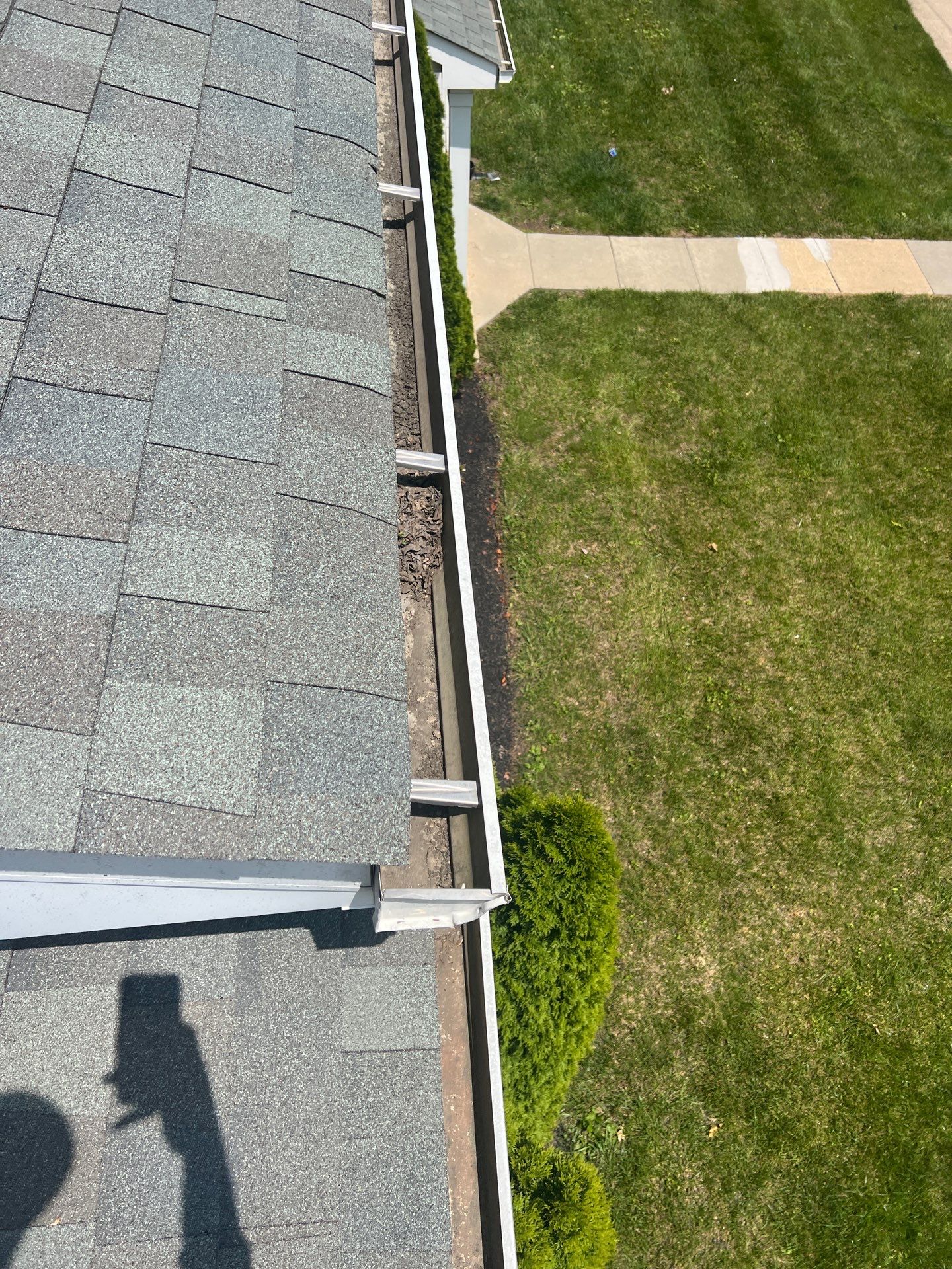 HOA gutter cleaning before photo.