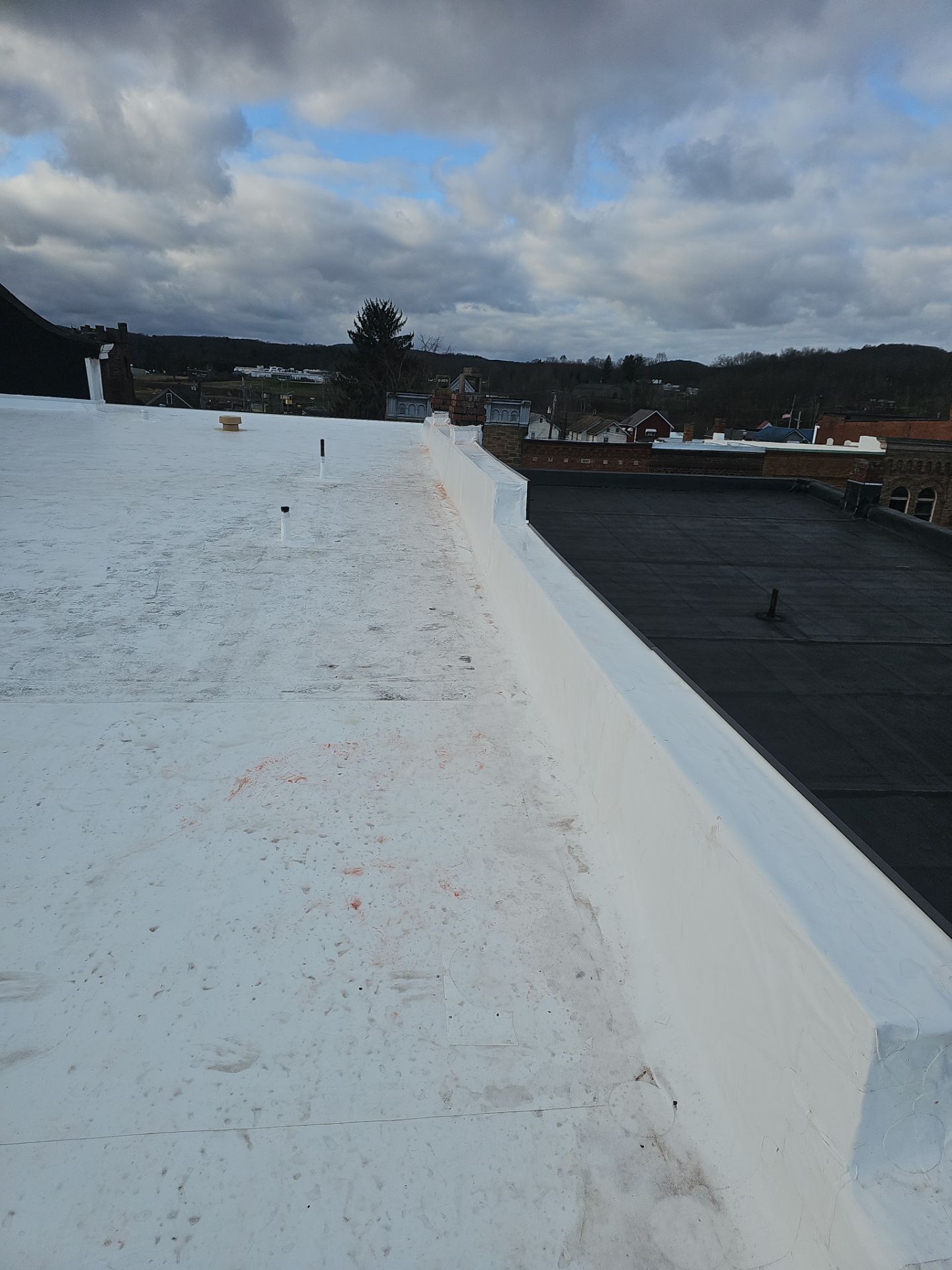 Western Auto  by 768 ROOF, LLC.