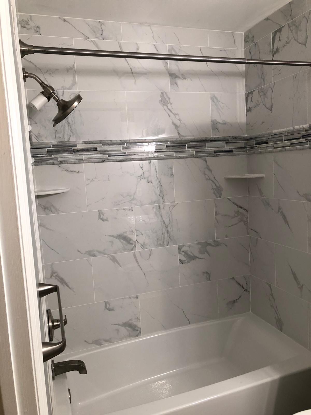 Bathroom Remodel using Tile by Home Concepts Construction