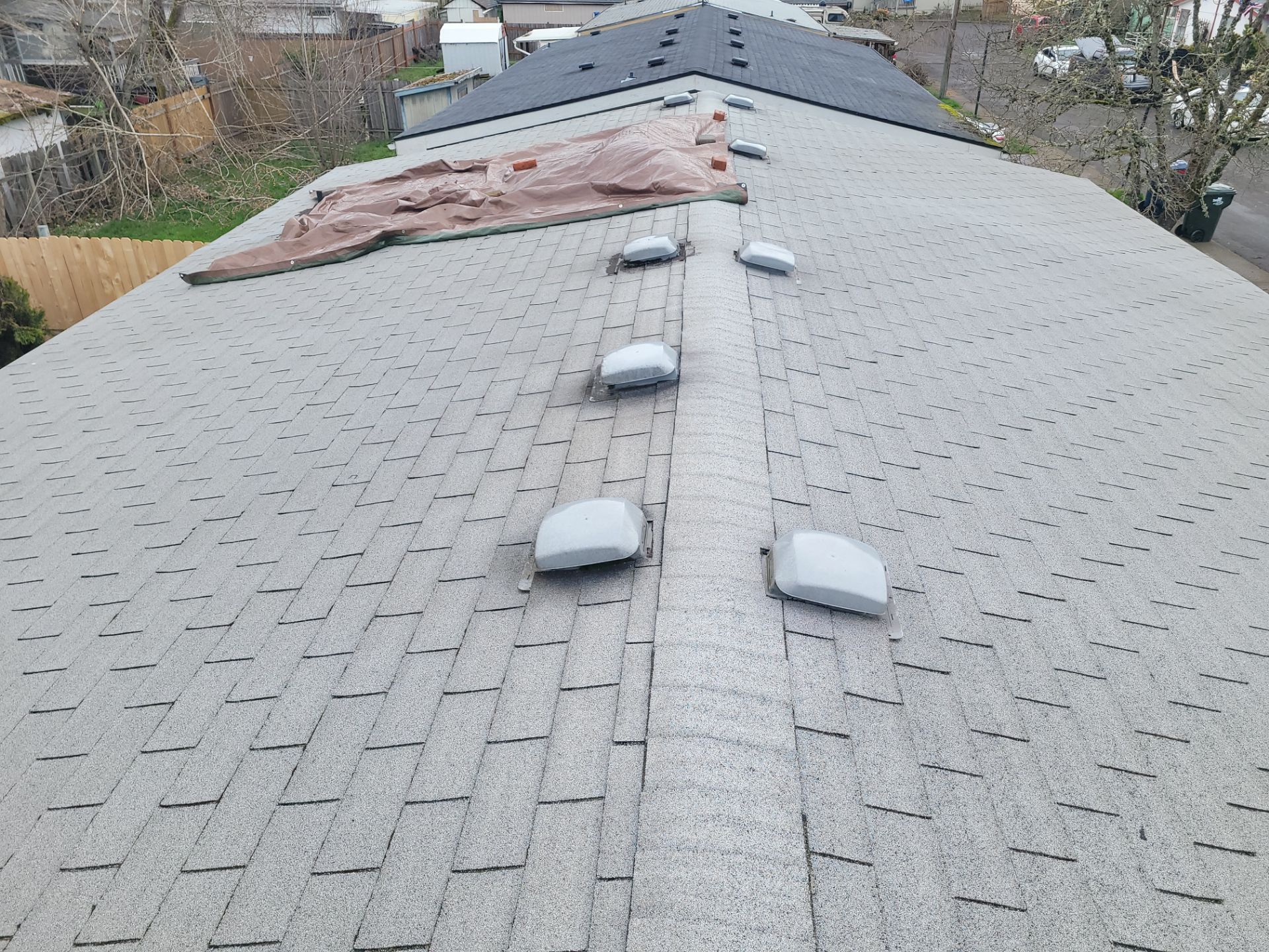Residential Reroof using Owens Corning Duration Shingles in the color Chateau Green. by BEST Roofing & Waterproofing