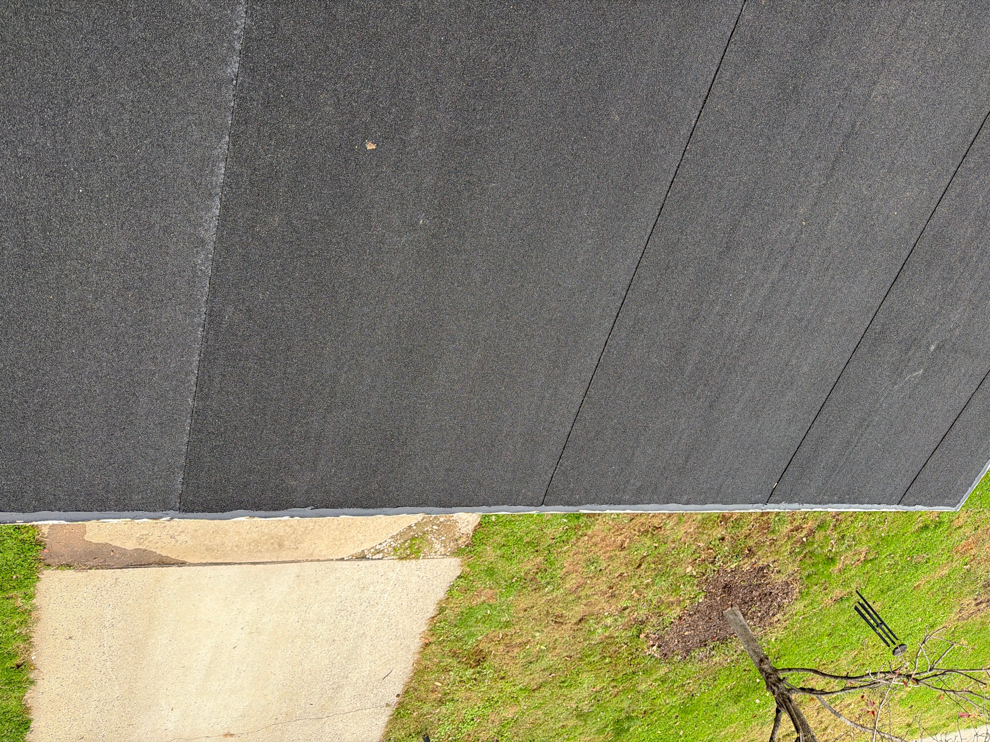 Flat Roof Replacement and Shingle Integration in Levittown by Stofan Construction LLC