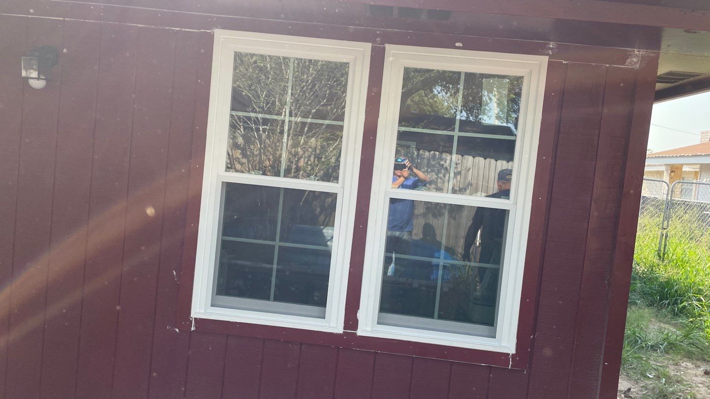 Black and white and red all over by Bayfront Roofing and Construction