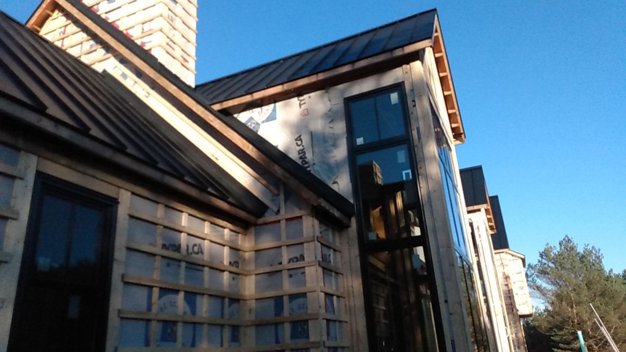 New Home Construction using 16" Standing Seam Panels by Jay Carter Roofing & Sheet Metal