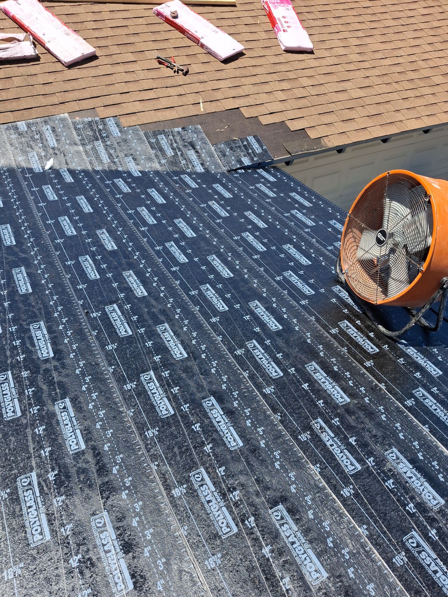 Chimneys need a Cricket.  by Bayfront Roofing and Construction