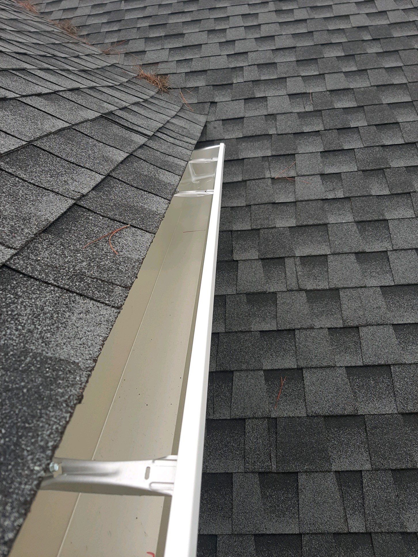 Gutter Installation using White K-Style Seamless Gutters by Gutter Professors