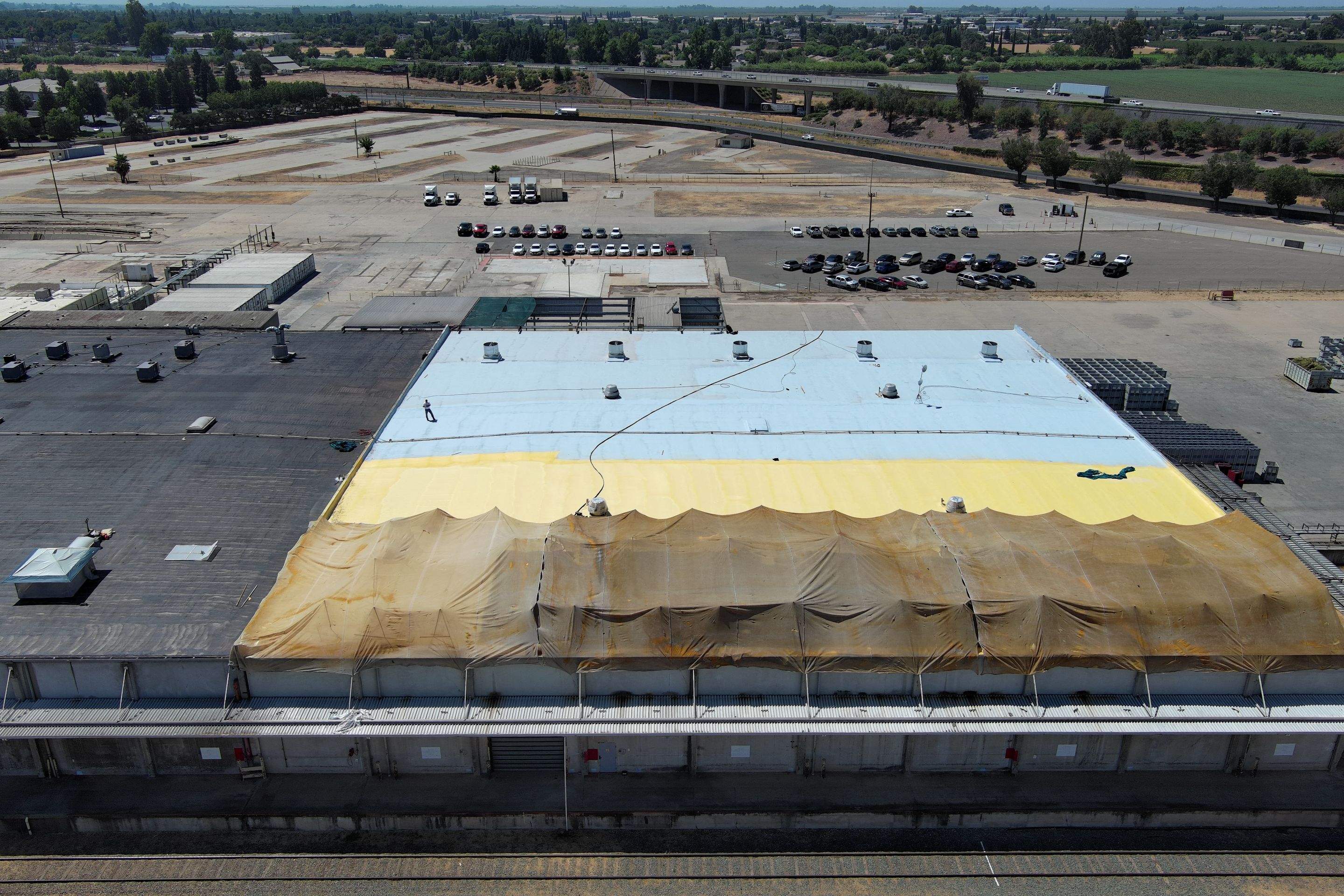 Pro Farms Spray foam roofing project by Straight Edge Roofing Inc