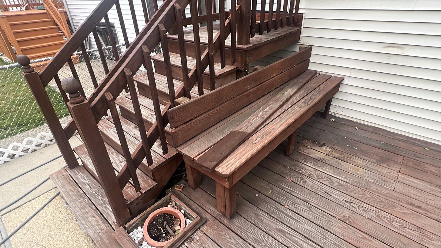 Wood cleaning and staining using Armstrong cloark oil stain by Northern Power Washing LLC.