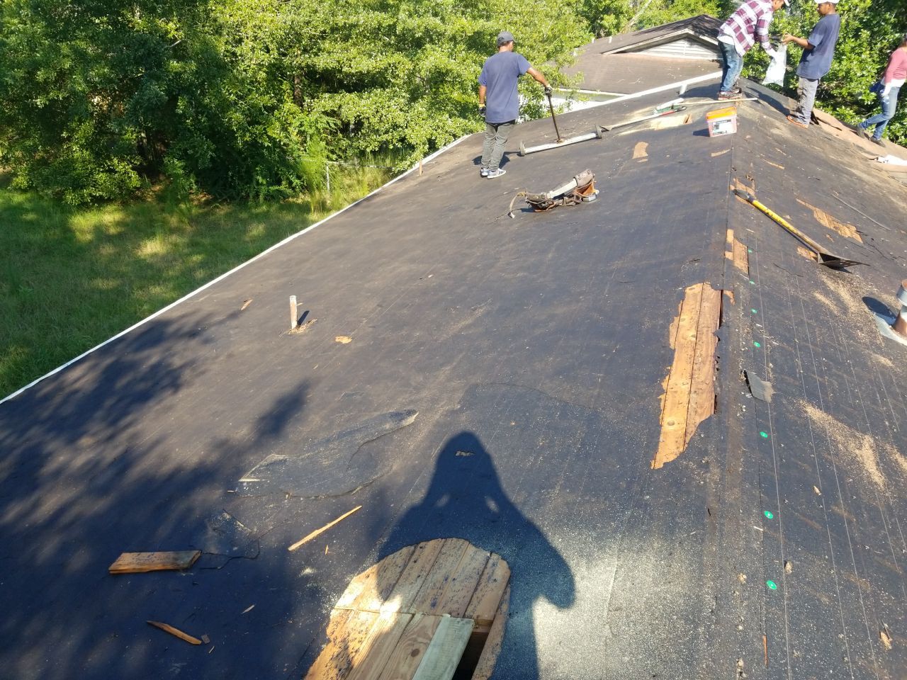 Residential Roofing Installation using Metal roofing by American Roofing & Construction LLC