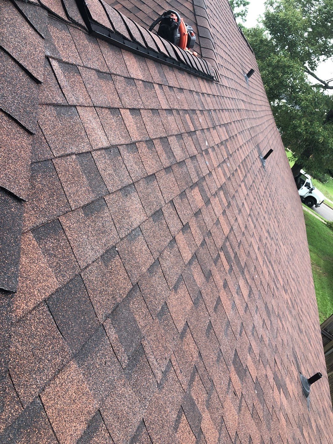 Residential Roofing Installation using Roof Replacement by American Roofing & Construction LLC