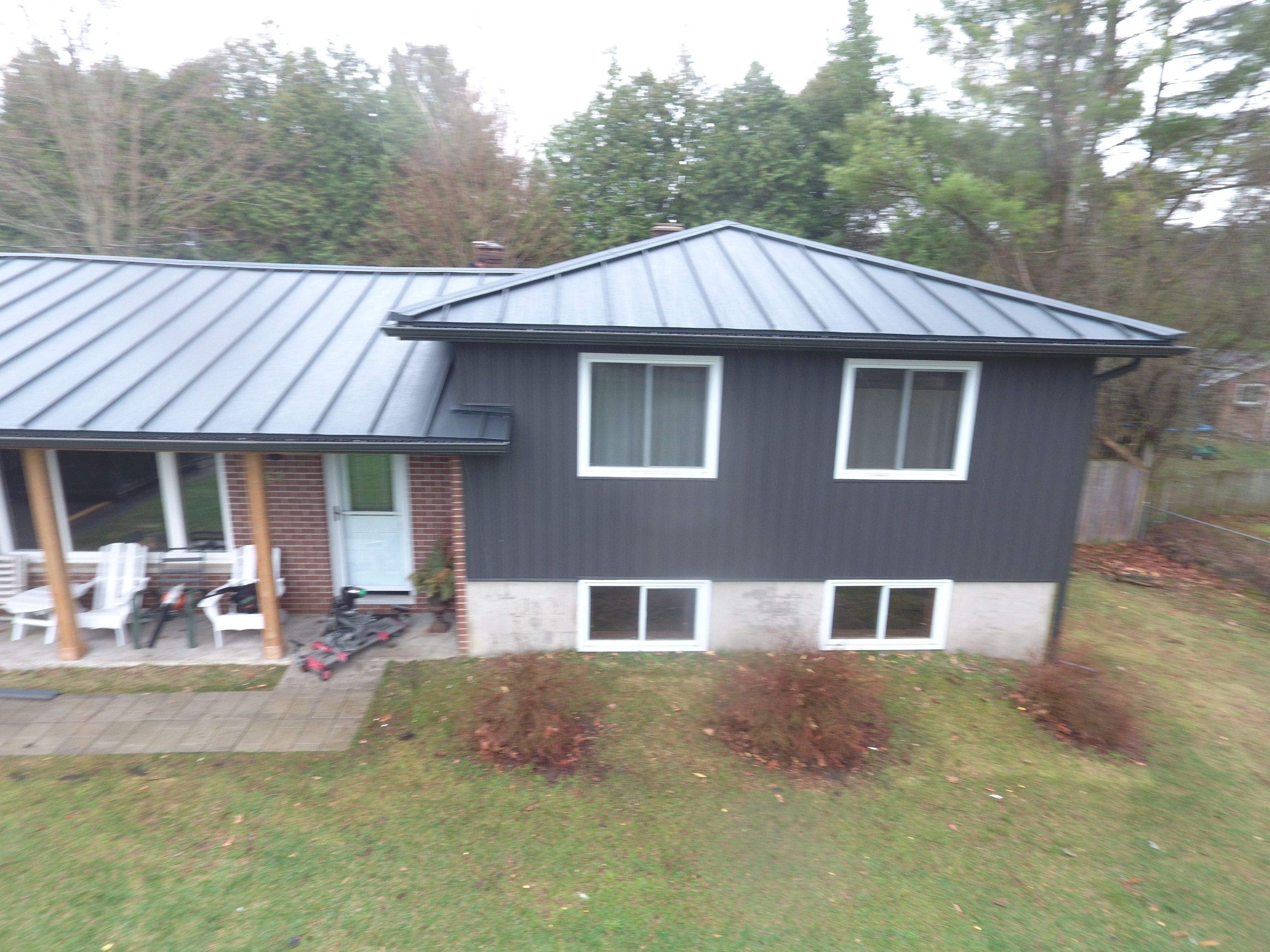Residential Roofing Installation using 24 Ga Standing Seam Metal by Jay Carter Roofing & Sheet Metal