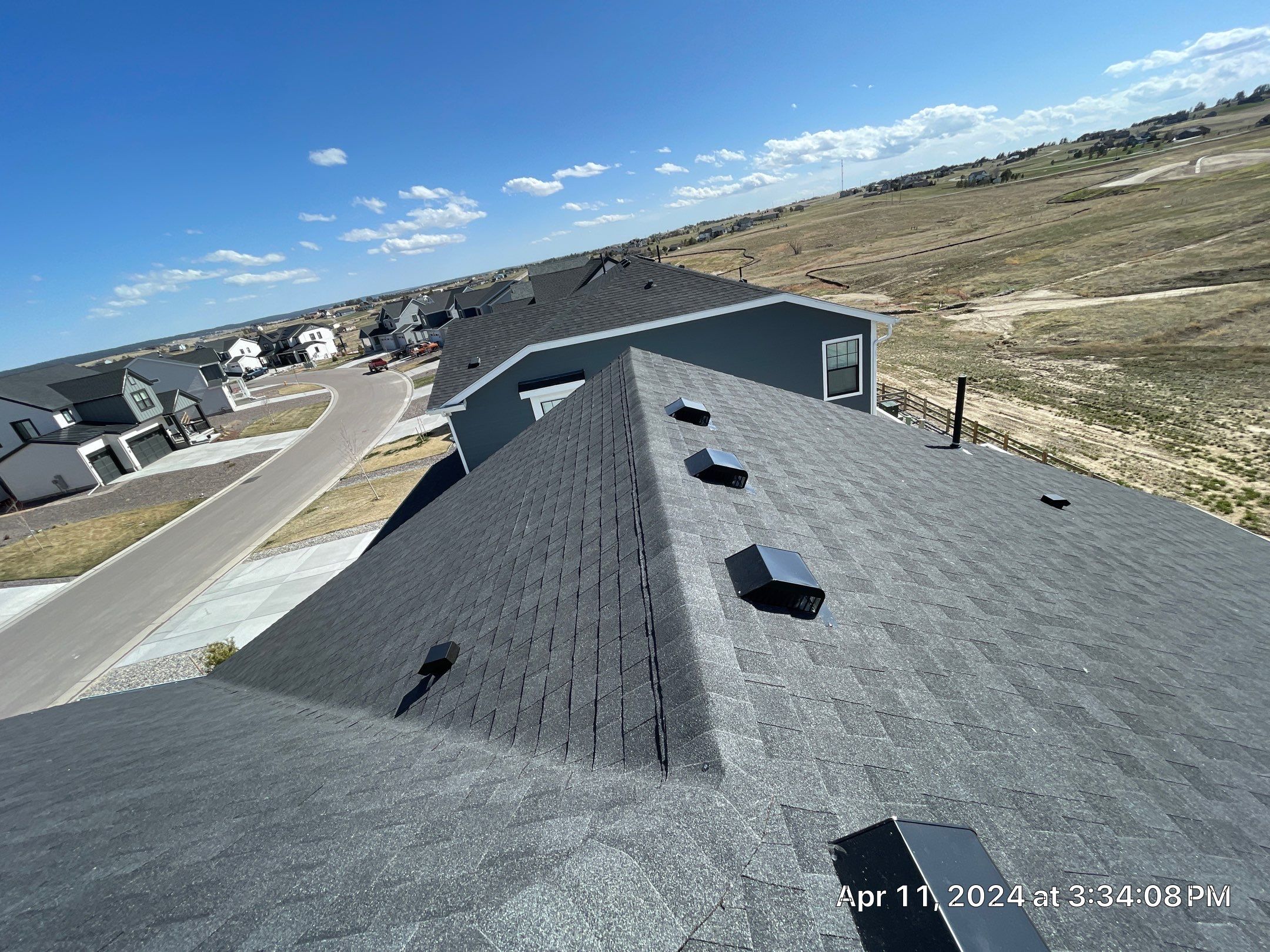Residential Roofing Installation using Atlas Pinnacle Impact Black Shadow by Blue Peaks Roofing LLC 