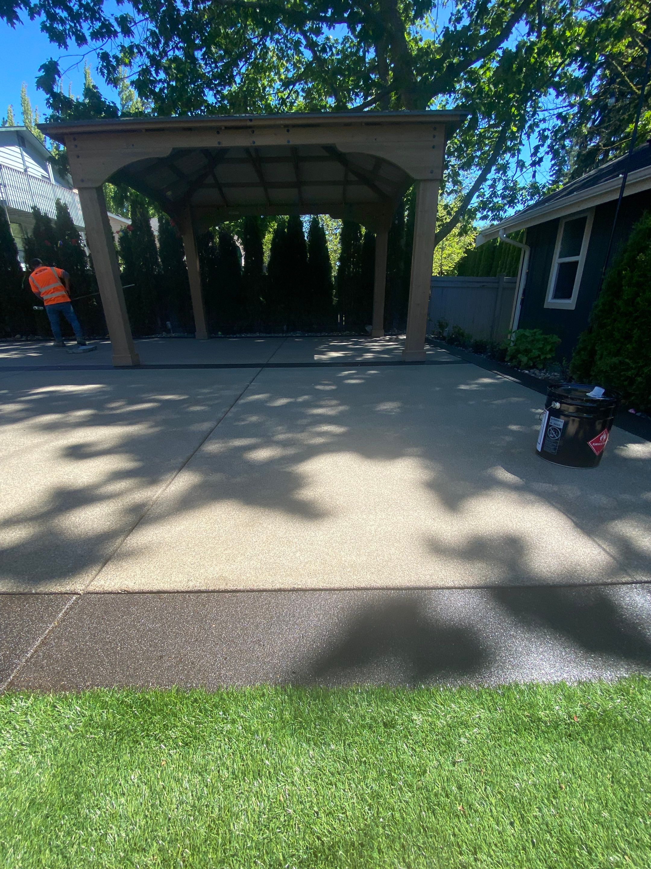 Patio Installation using Concrete, Retaining walls, and Turf install by Jireh Asphalt & Concrete Inc 