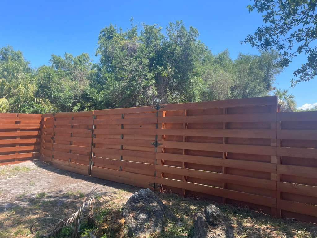 Horizontal Shadowbox Fence in Port Charlotte by True Fence LLC