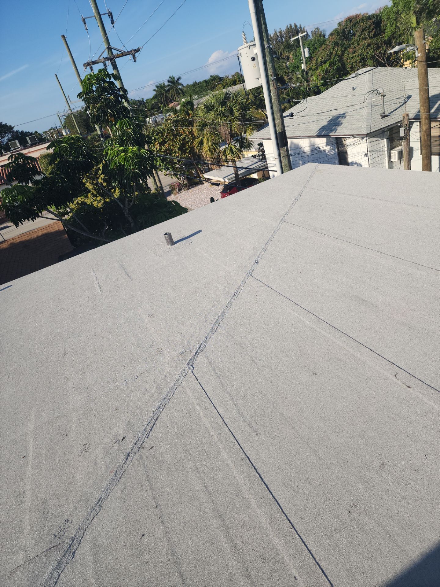 Flat Roof Replacement and Insulation Upgrade in Lake Worth Beach by Aastro Roofing