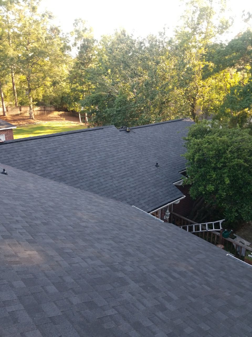 Residential Roofing Installation using Roof Replacement by American Roofing & Construction LLC