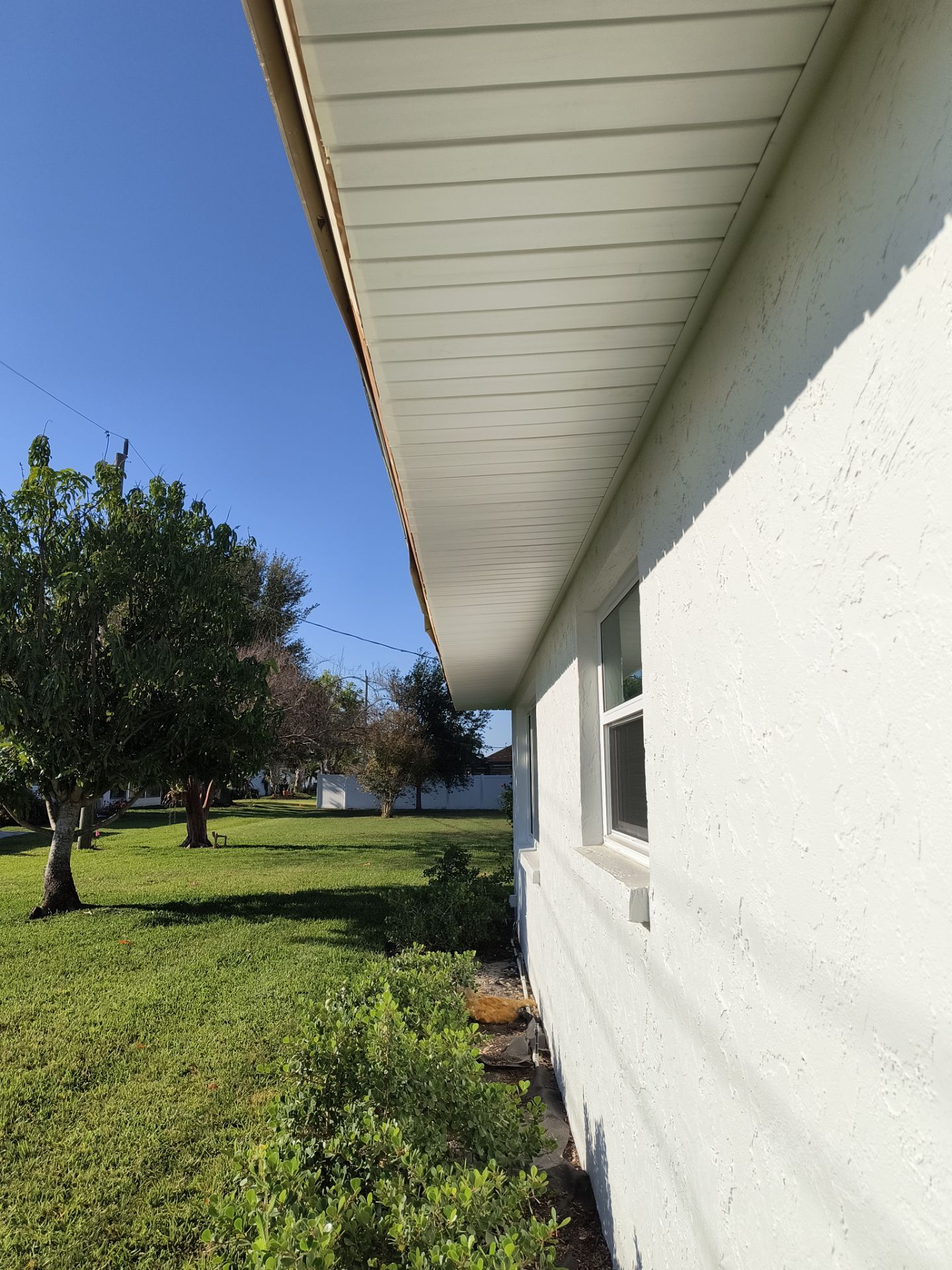 Aluminum White Soffit Installation in Sarasota FL by Gutter Professors