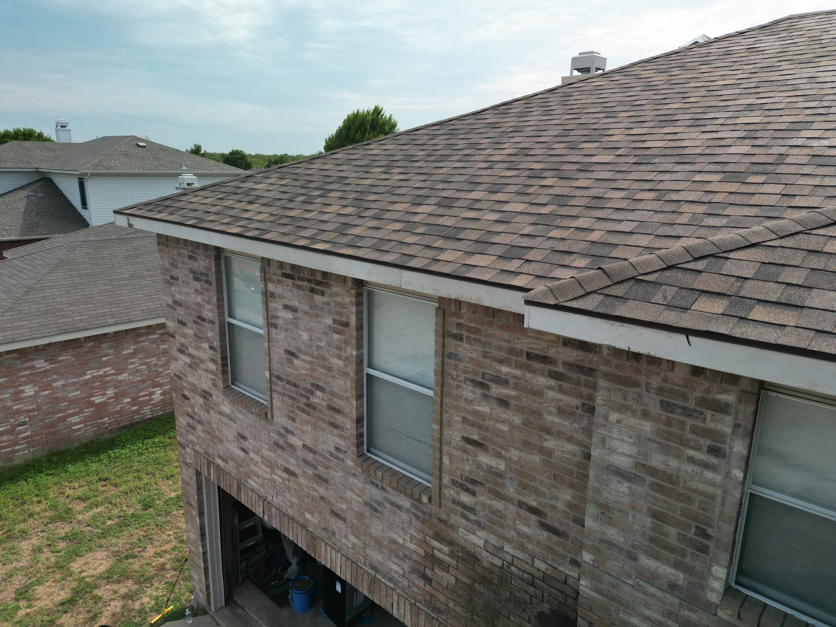 Full Roof Replacement, Chimney Rebuild and Interior Damage Replacement by First United Roofing & Construction