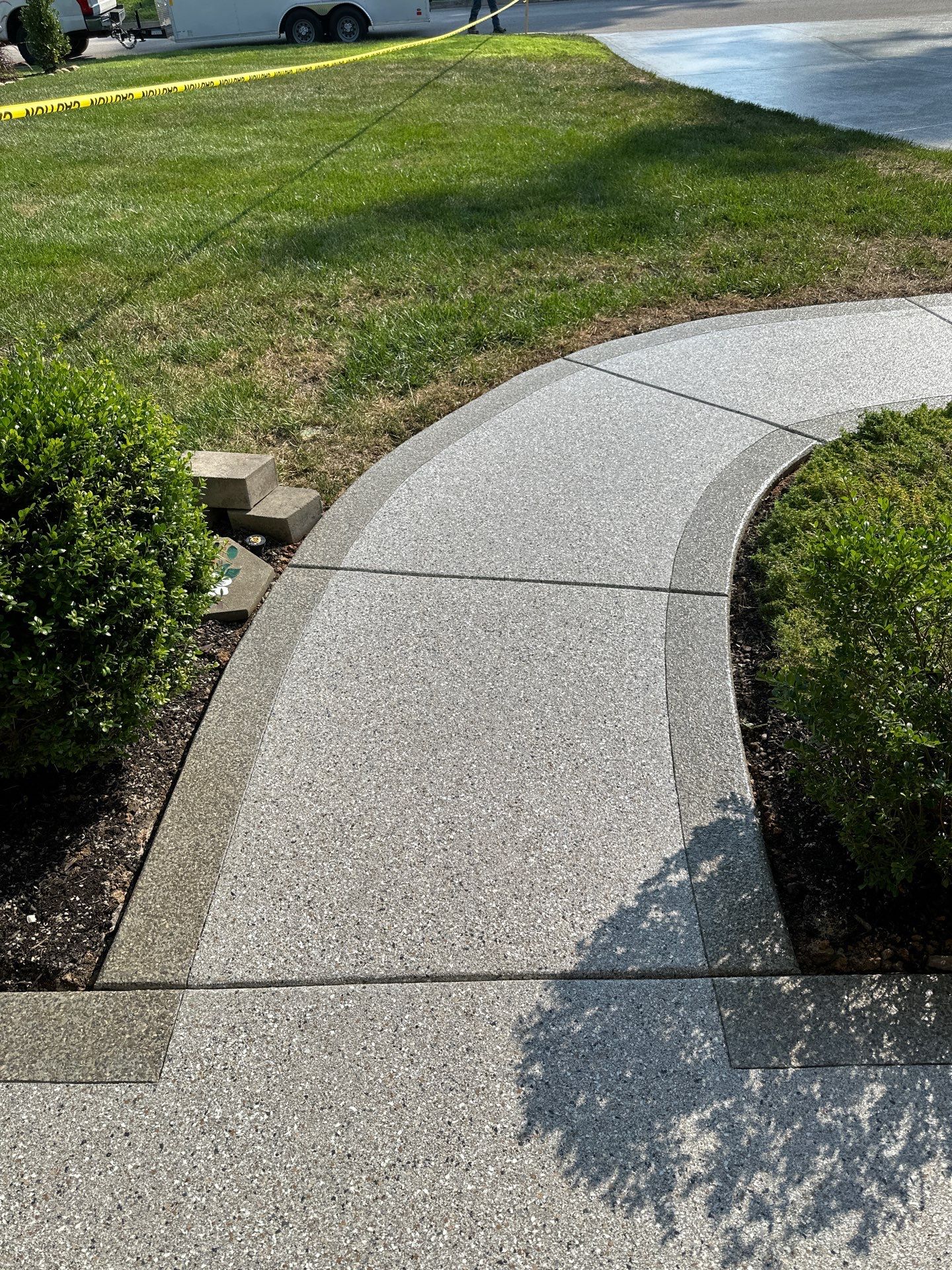 Driveway Improvement Using Claystone With Trail Mix Border! by Elite Floor Solutions