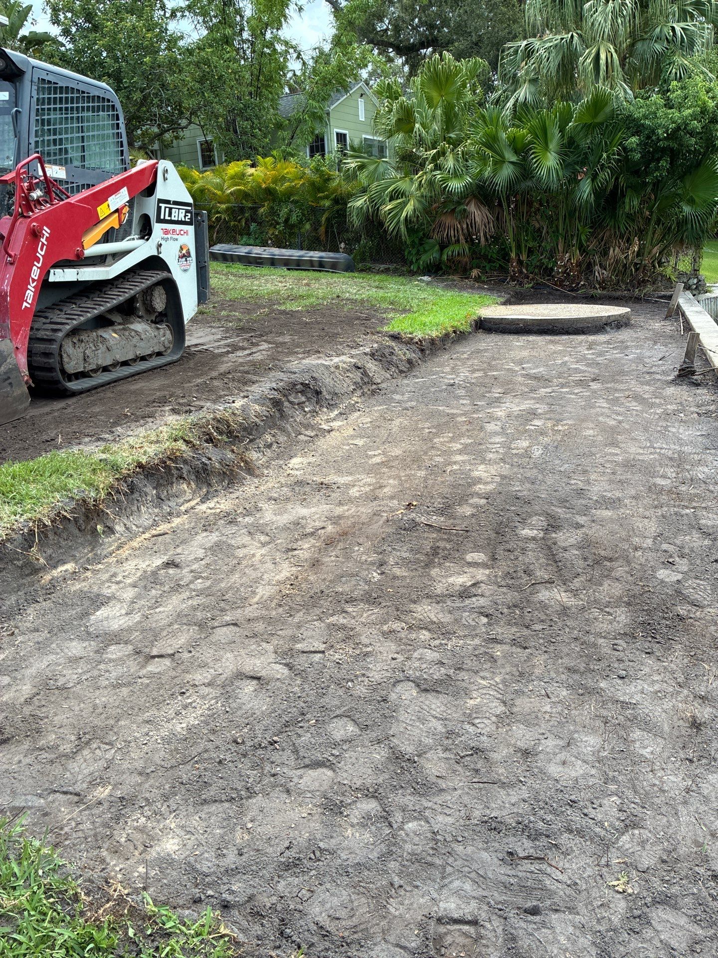 Grading back yard oasis by Level One Grading