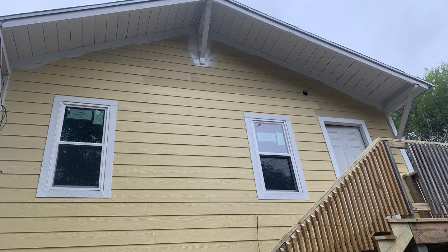 Up Town, Up Class by Bayfront Roofing and Construction