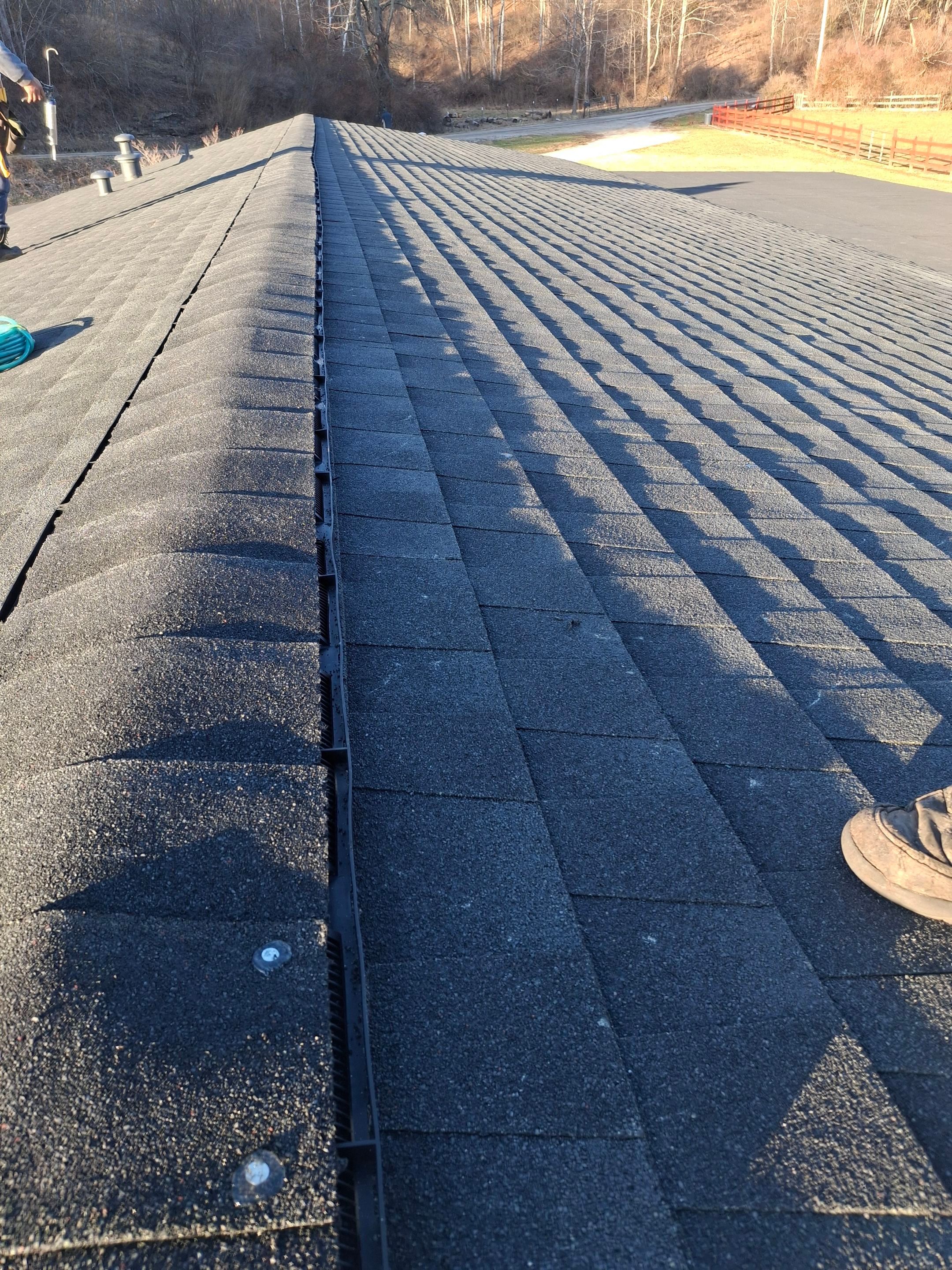 Residential Roofing Installation using GAF Timberline HDZ Charcoal by Rainstoppers Roofing