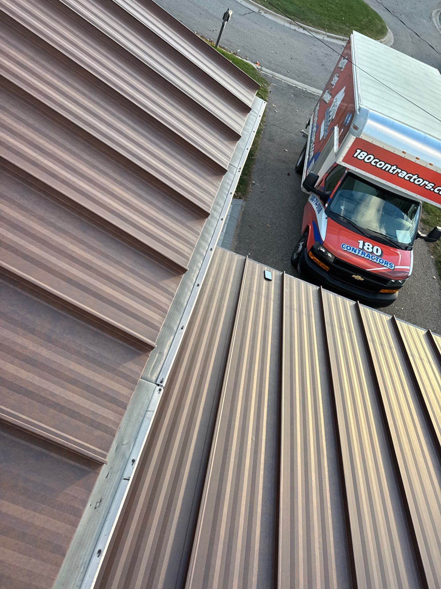 Roof Replacement using MS Standing Seam Roof Western Rust by 180 Contractors