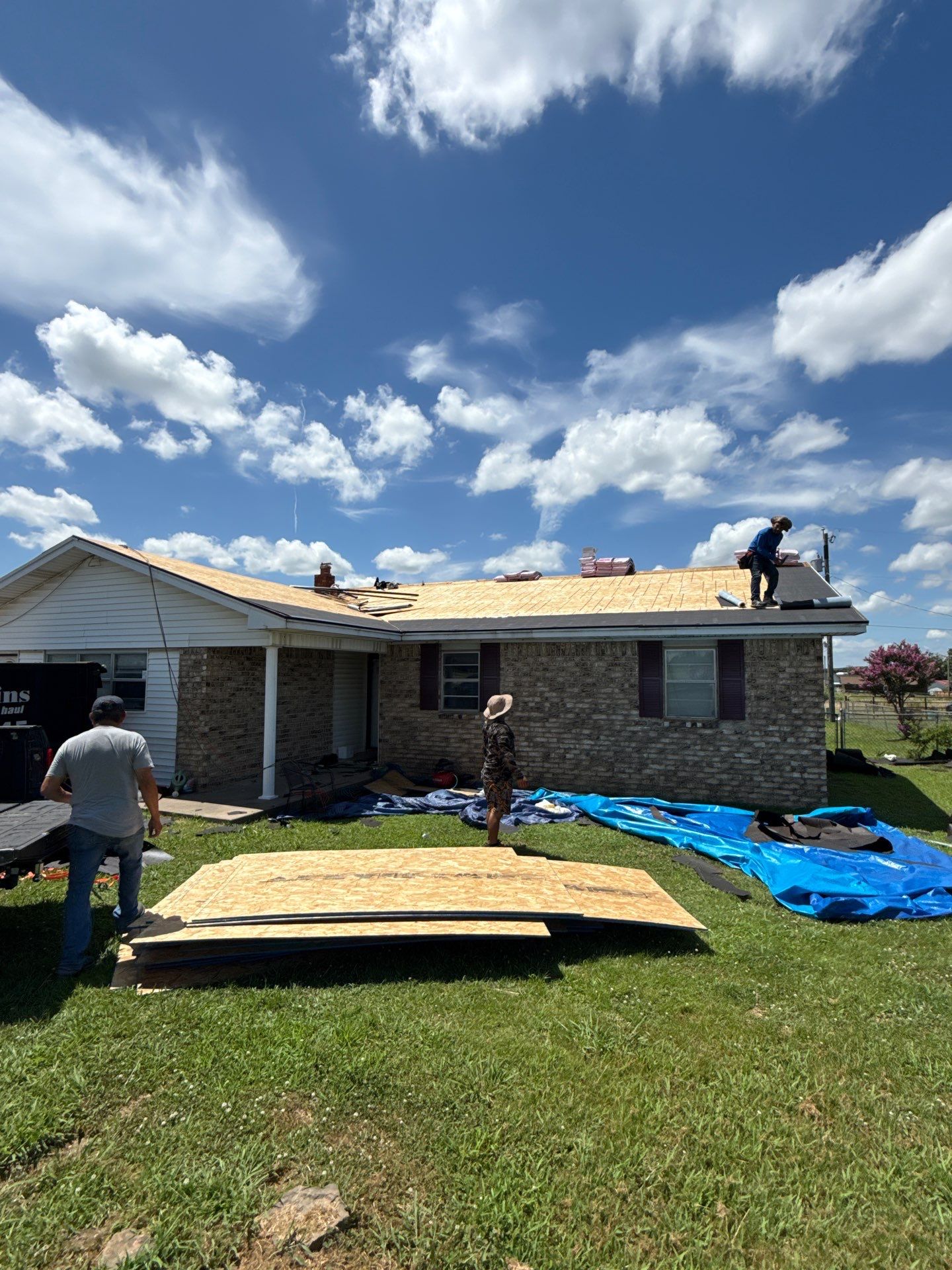 New roof & siding paid by insurance. Along with new roof sheathing.  by In & Out Construction & Remodeling, LLC