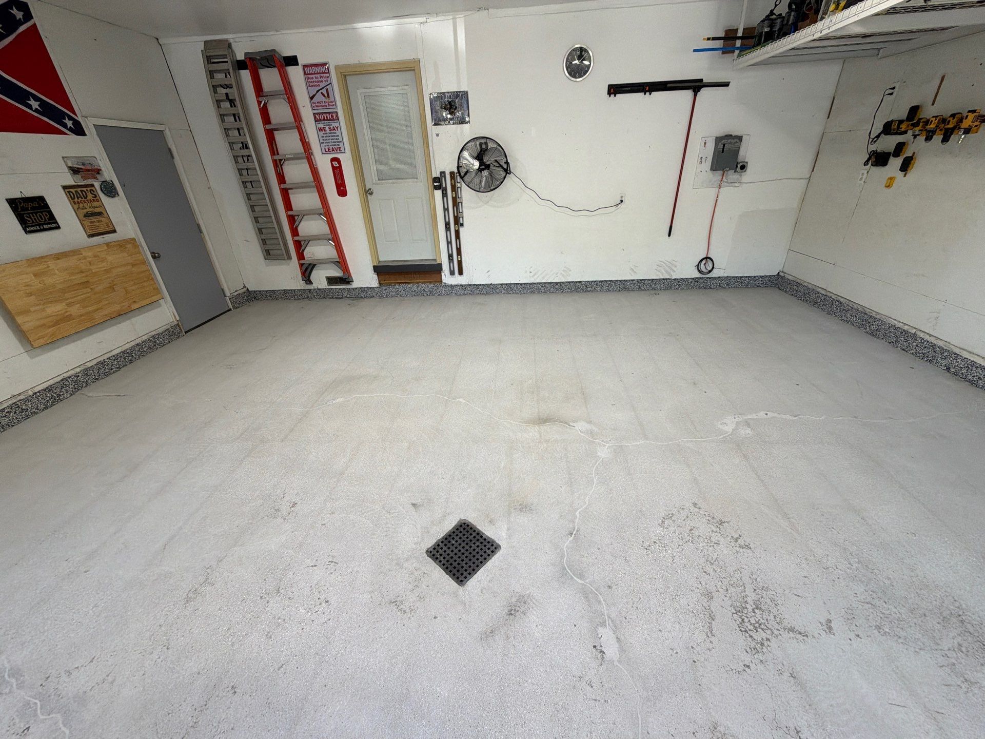 Custom Speckled Epoxy Garage Floor Coating in Fruitport, Michigan by Gordon Painting