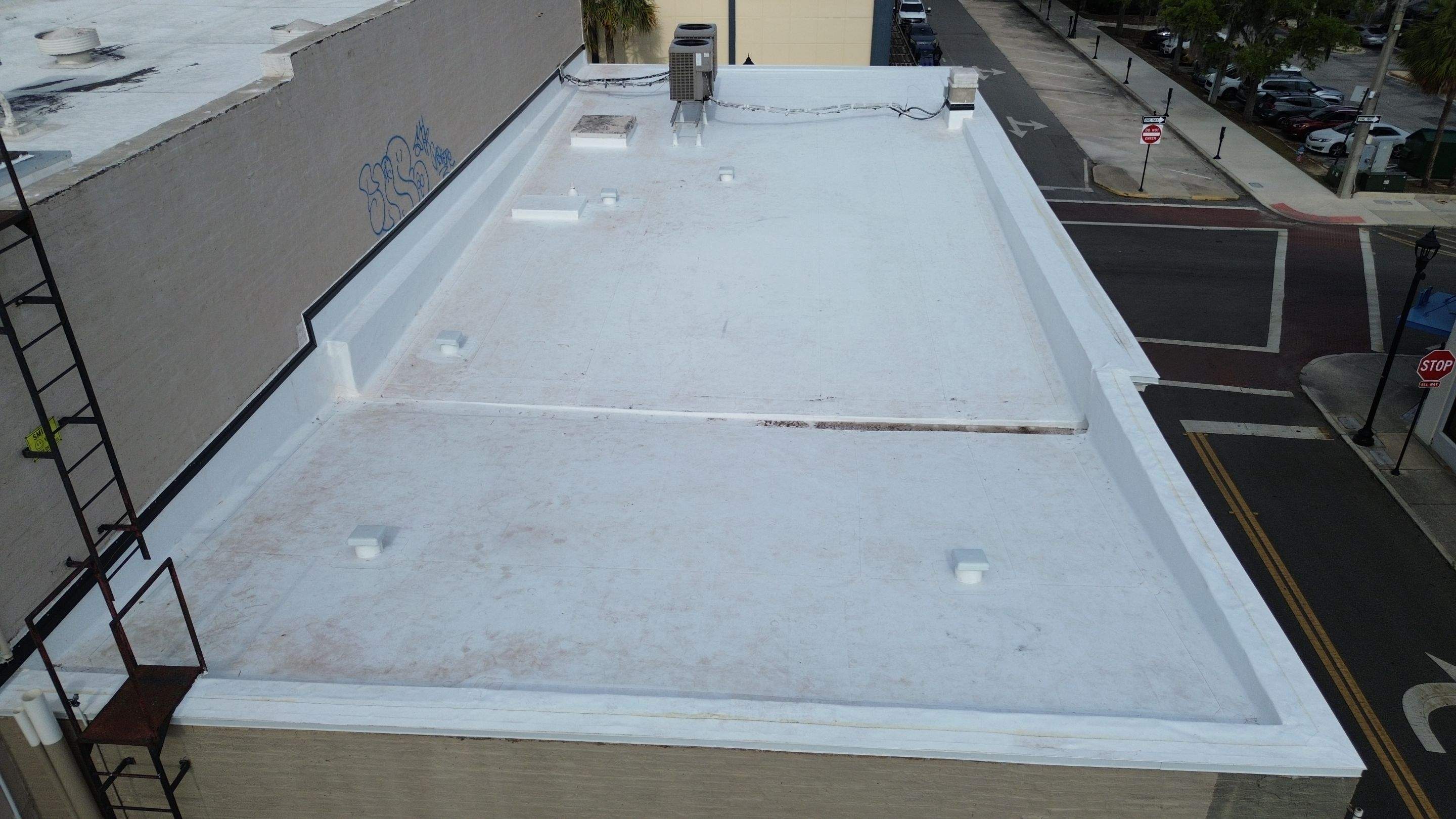 Flat Commercial TPO Reroof in Downtown Ocala, FL by Brehm Roofing