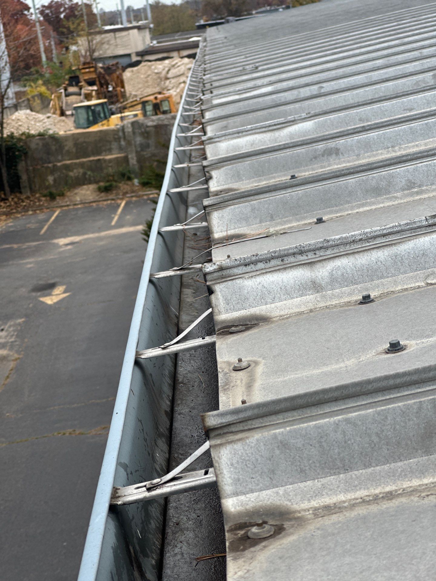 Commercial Roof and Gutter Cleaning  using Gutter and roof cleaning supplies by Above All Gutters 