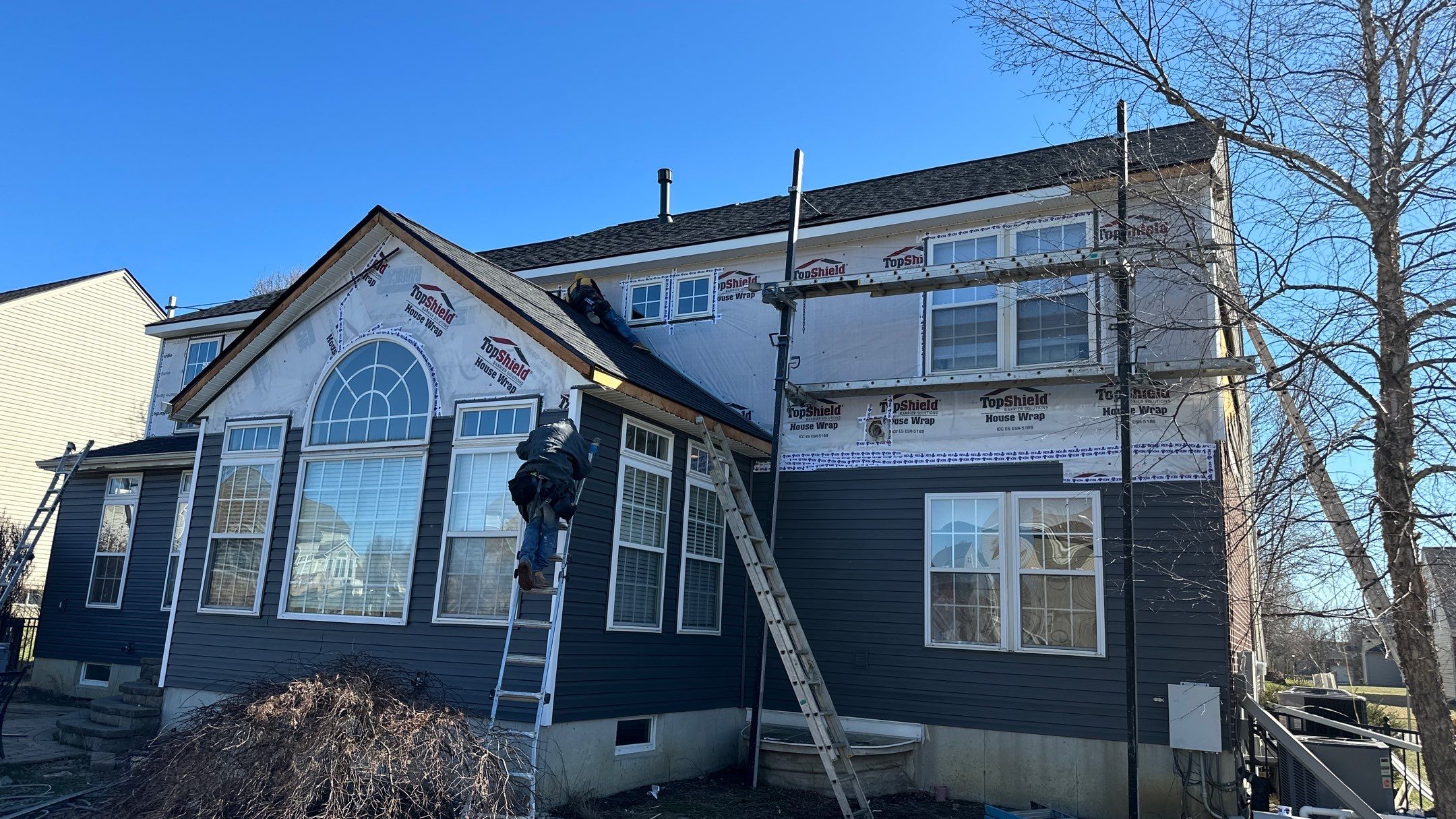 Roofing & Siding  by Tamlin Roofing