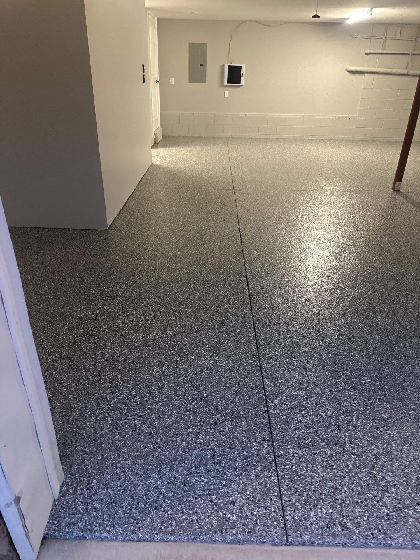 Garage Floor Coating using Wombat by My Garage Floor Guys