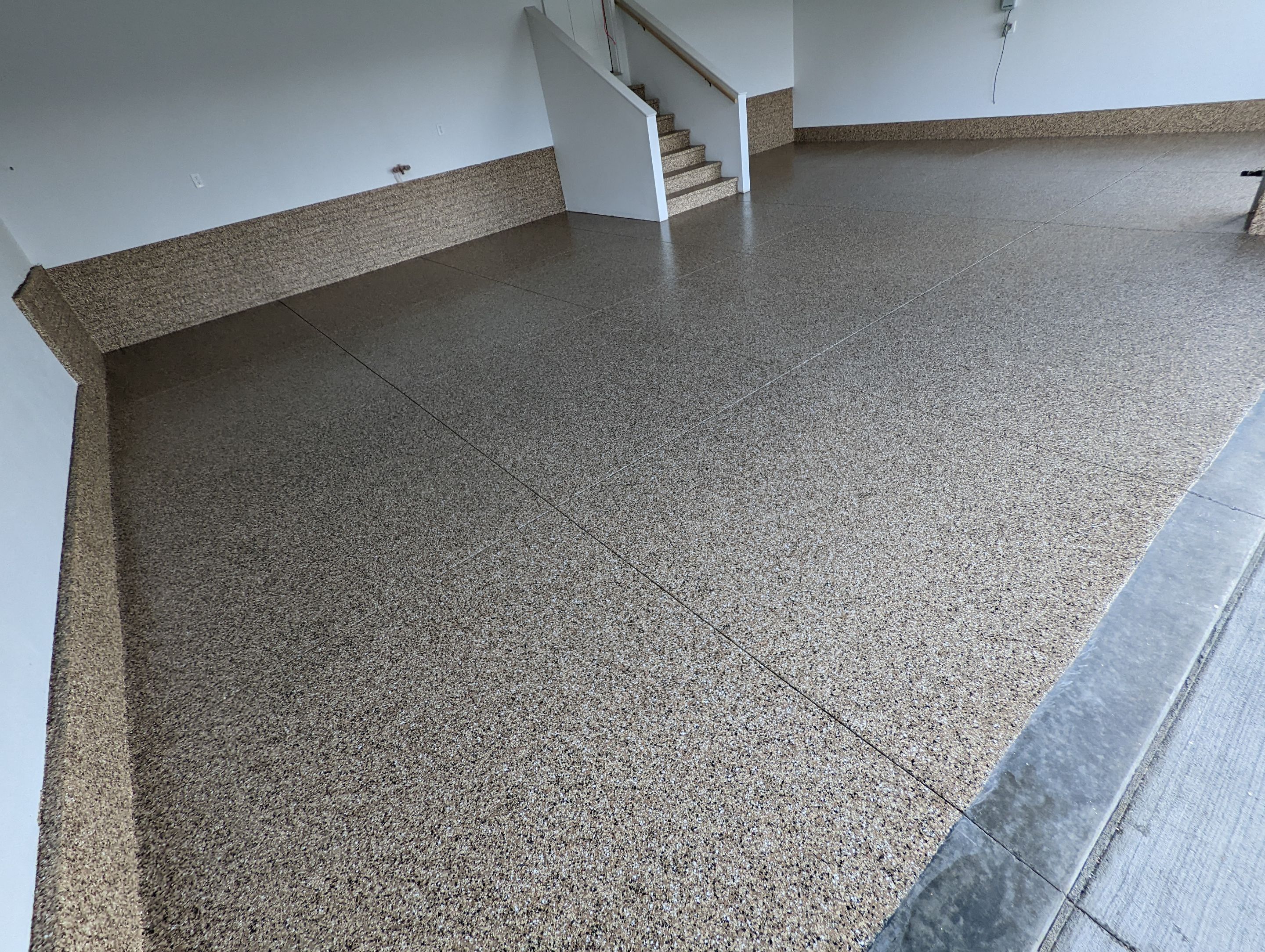 Garage using Sandstone by Select Painting, Coatings & Garage Cabinets