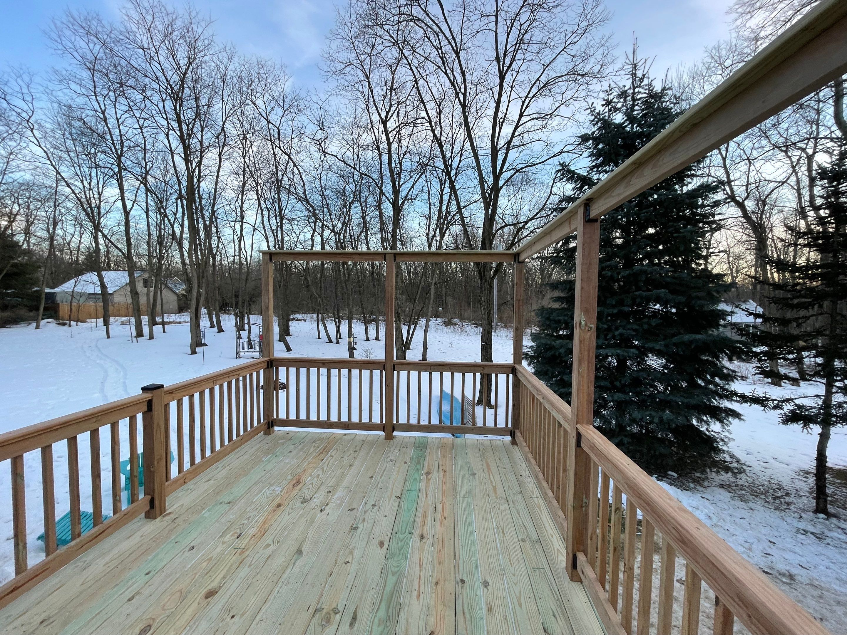 Deck Installation using Treated Lumber by Avalon Roofing and Exteriors