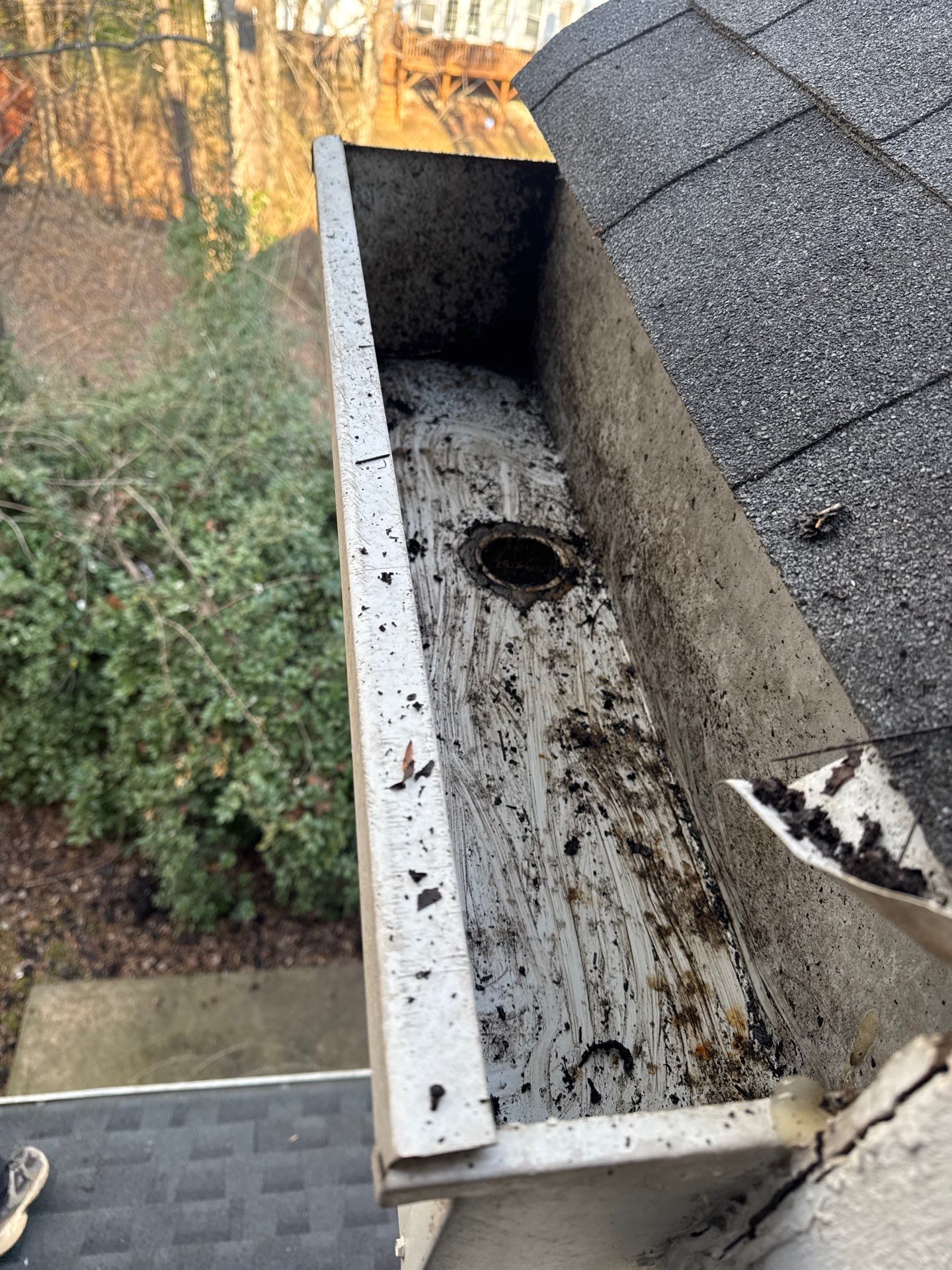 HOA gutter cleaning in Rock Hill, SC,after  photo showing full gutters.