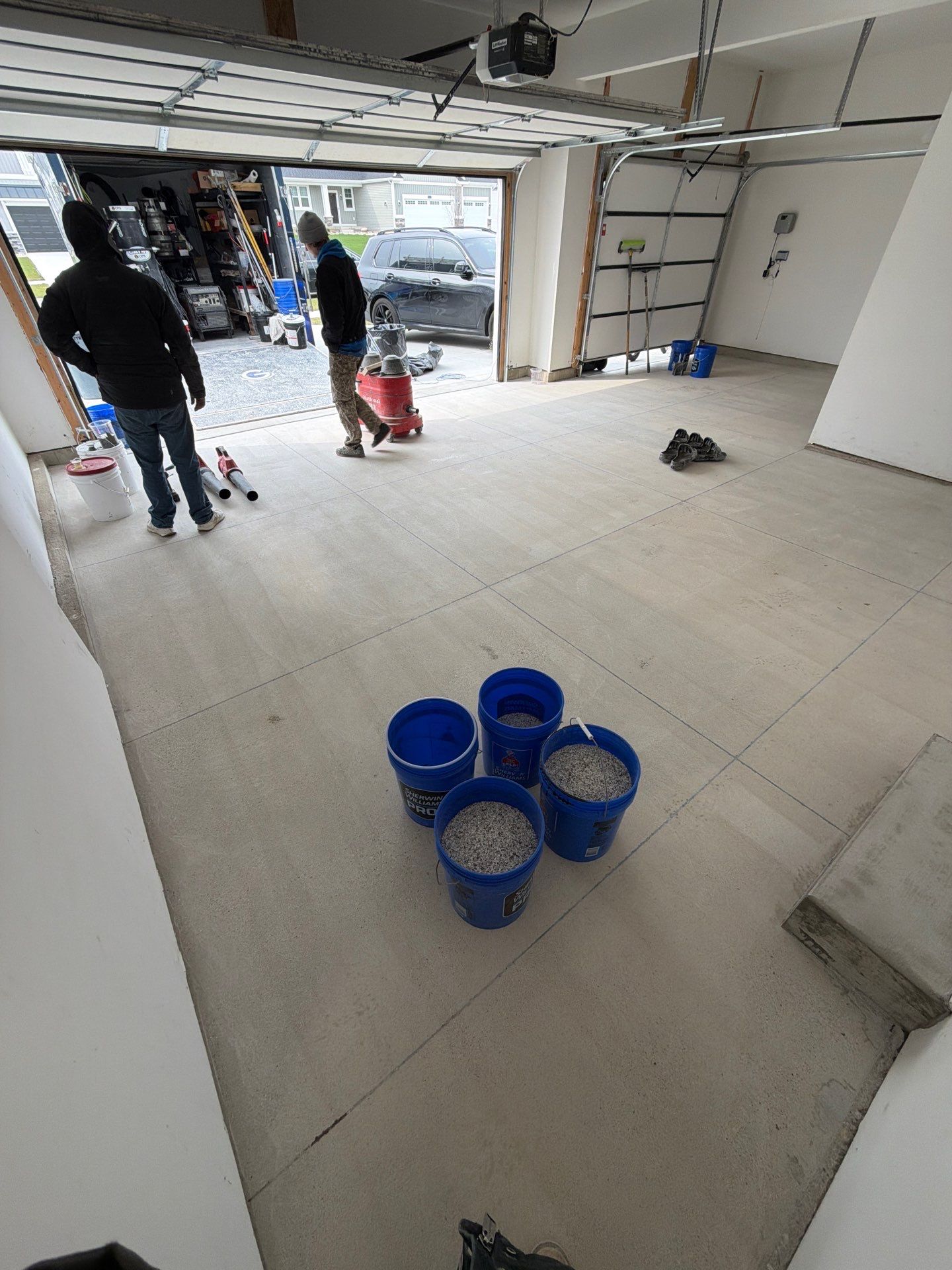Multi-Car Garage Epoxy Flake Floor Installation in Byron Center by Gordon Painting