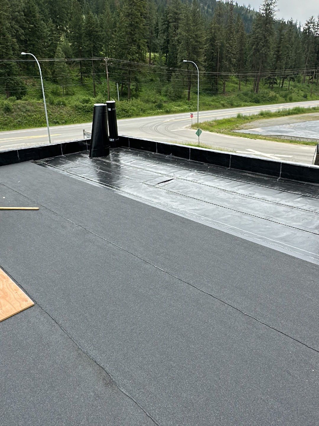 Commercial Roofing Installation using IKO 2ply sbs  by Top Notch Roofing Inc