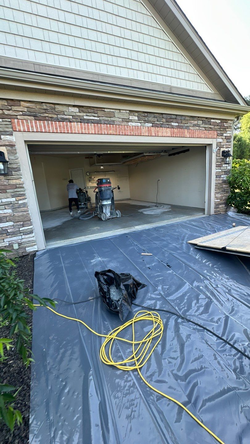 Porch + Walkway + Garage Project in Renfrew by Floors in a Day, Inc